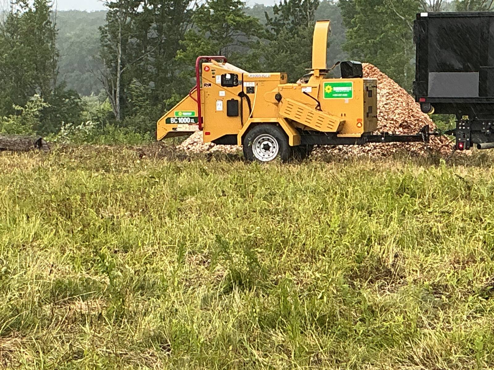 Wood chipper processing cleared brush at the Endicott site
